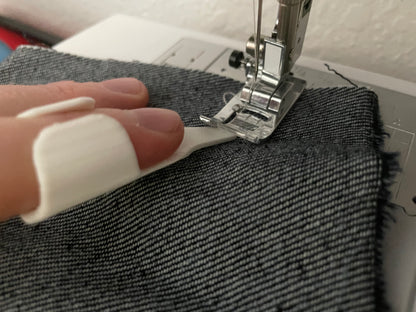 sewing finger thing