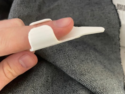 sewing finger thing