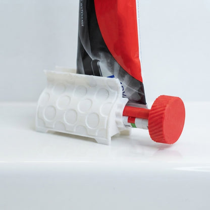 Toothpaste squeezer